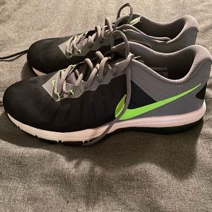 Neon green and black Nike men’s shoes